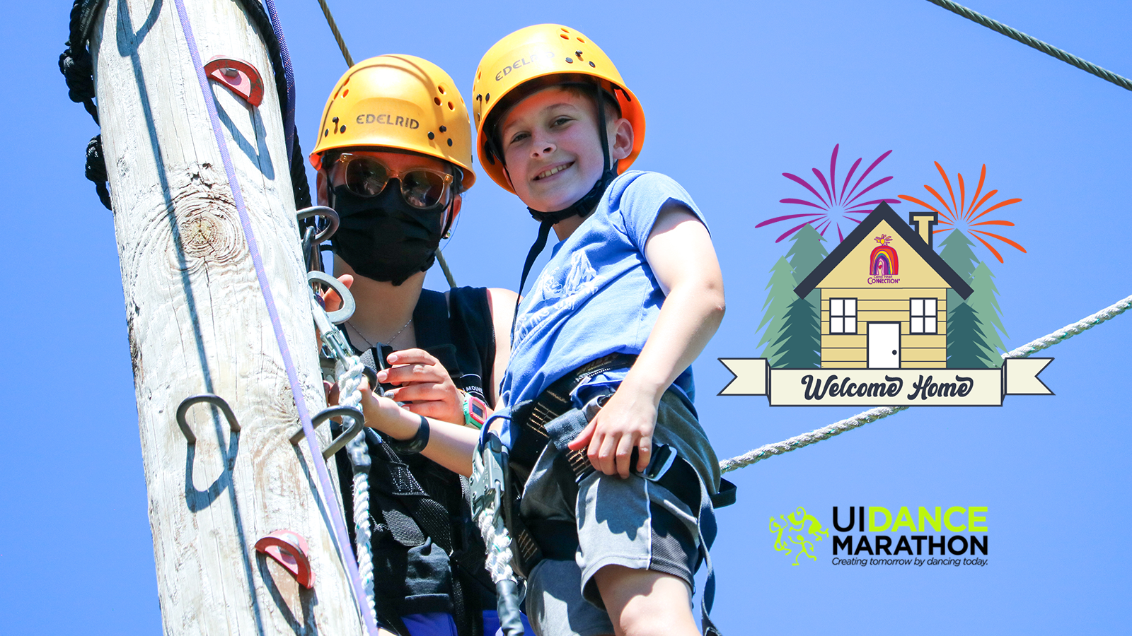 child on the climbing tower with welcome home logo