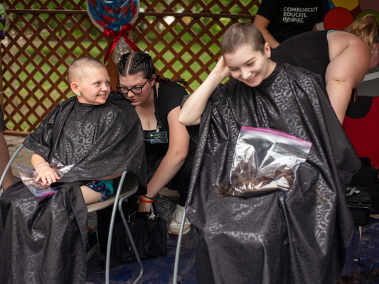 summer camp friends donate their hair